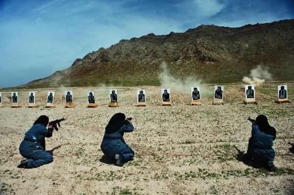 Women — mostly widows — train for police force jobs at a firing range near Kabul in this photograph by Lynsey Addario. It will be included in the exhibit “Women of Vision: National Geographic Photographers on Assignment,” on view at Fernbank Museum of Natural History starting Sept. 26.