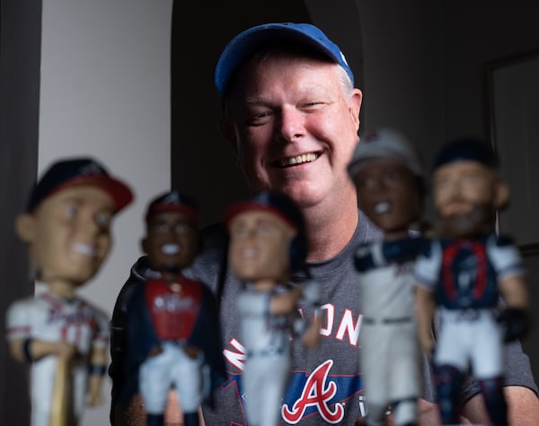 Thomas Helland has been a Braves fan since moving to Atlanta in 1993, though under other circumstances he also roots for the Astros. Ben Gray for the Atlanta Journal-Constitution