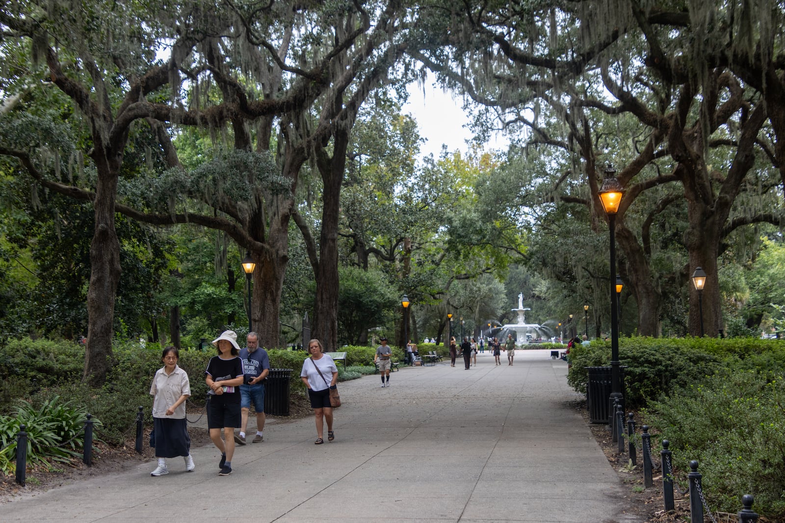 People stroll through Forsyth Park on Sept. 18, 2024. “When you think about the historic tourism product that is Savannah, really Forsyth Park is our showpiece,’’ says Erica Backus, spokesperson of the Savannah Area Chamber of Commerce. (Katelyn Myrick for the AJC)