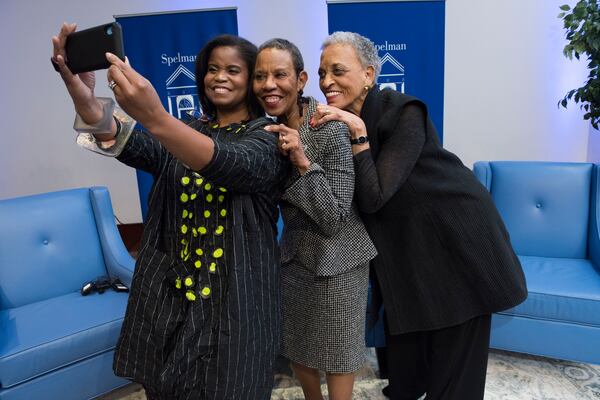 Johnnetta Betsch Cole (far right), along with Andrea Barnwell Brownlee ('94) and former Spelman President Mary Schmidt Campbell, pose for a selfie.  Julie Yarbrough Photography