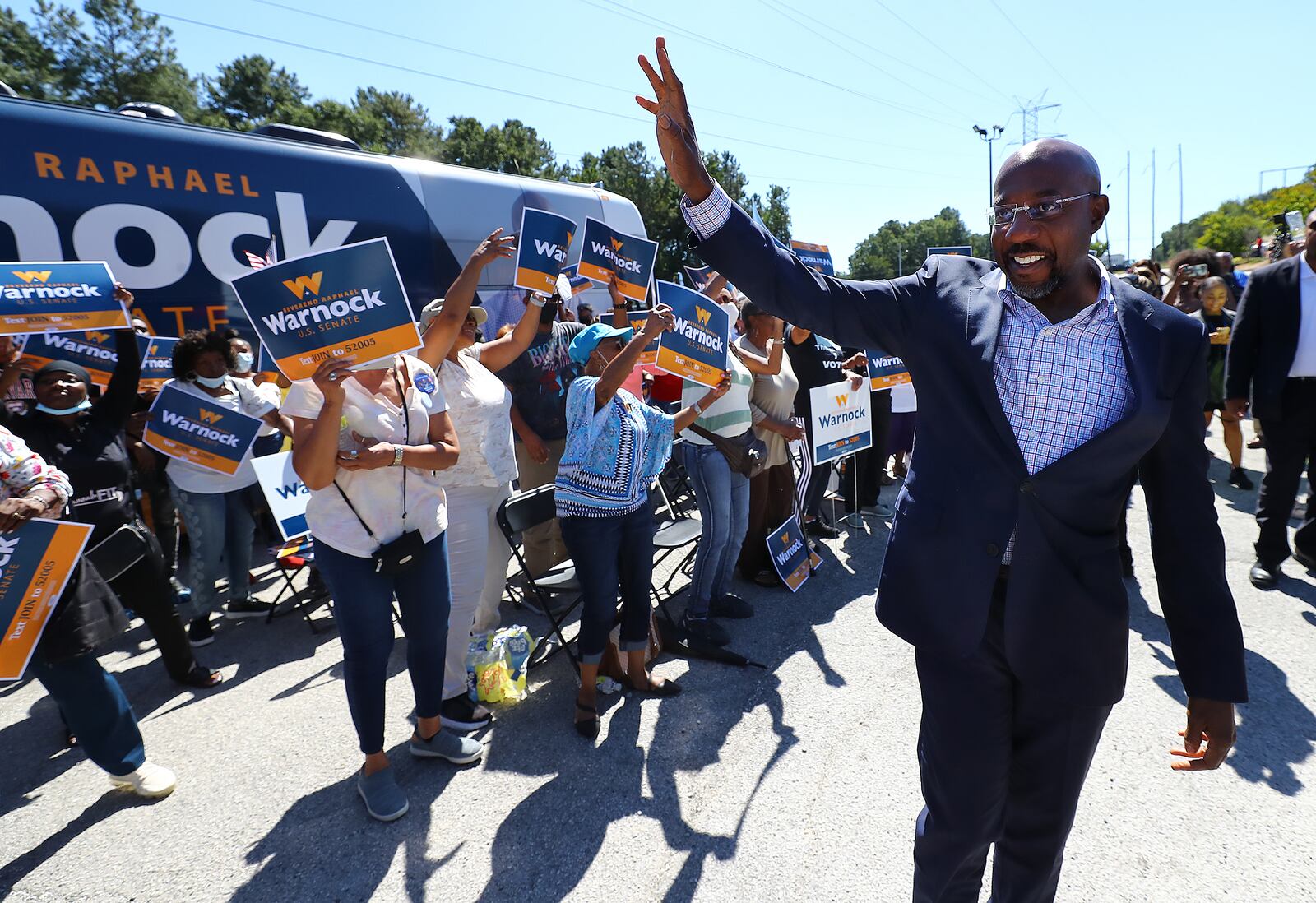 U.S. Sen. Raphael Warnock indicated he’s exploring new ways to help Hyundai Motor Group benefit from a federal climate package that was intended to boost American-made electric vehicles. He is pictured arriving at a campaign stop in Atlanta on Sept. 26, 2022. (Curtis Compton / AJC)