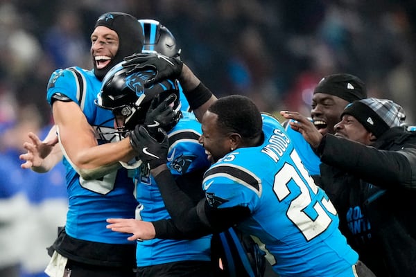 Carolina Panthers kicker Eddy Pineiro celebrates after kicking the game-winning field goal in overtime against New York Giants during an NFL football game, Sunday, Nov. 10, 2024, in Munich, Germany. (AP Photo/Matthias Schrader)