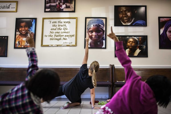 Linzi Prpich teaches a group of young girls dance at Proskuneo, a music school in Clarkston that provides free lessons every Saturday morning on a variety of instruments for refugee children. Proskuneo’s other programs include dance and art. BRANDEN CAMP / SPECIAL