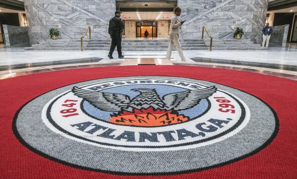 Employees at Atlanta City Hall were handed instructions as they come through the front doors to not turn on computers or log on to their workstations on Friday March 23, 2018. JOHN SPINK/JSPINK@AJC.COM