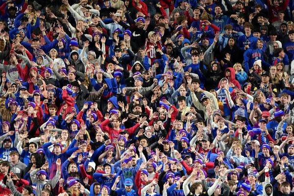 Kansas fans celebrate after a touchdown during the second half of an NCAA college football game against Colorado, Saturday, Nov. 23, 2024, in Kansas City, Mo. (AP Photo/Charlie Riedel)