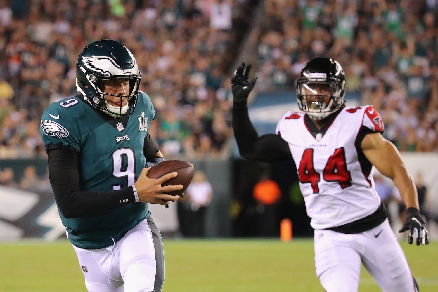 Photos: Falcons fall to Eagles in season opener