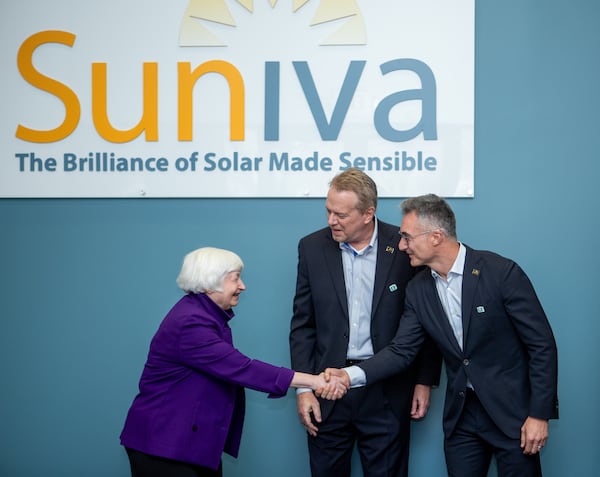 Secretary of the Treasury Janet Yellen (left) meets with Suniva President and COO Matt Card (center) and CEO Cristiano Amoruso on Wednesday, March 27, 2024, at the company's Norcross factory. (Jenni Girtman for the AJC 2024)