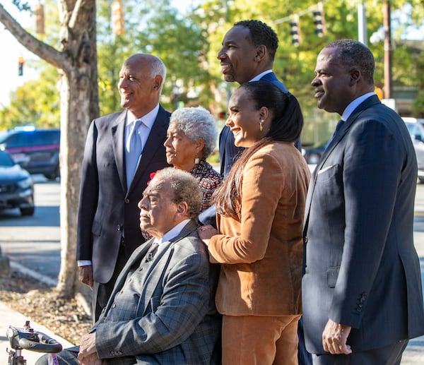 At a 2004 ceremony unveiling a new MARTA bus featuring former Atlanta Mayor Andrew Young (seated), he was joined by current Mayor Andre Dickens (back middle) and all of the city's former mayors, including Bill Campbell (standing left), Shirley Franklin, Keisha Lance Bottoms and Kasim Reed. Following Maynard Jackson in 1973, Atlanta has been run by Black mayors. (Jenni Girtman for The Atlanta Journal-Constitution)