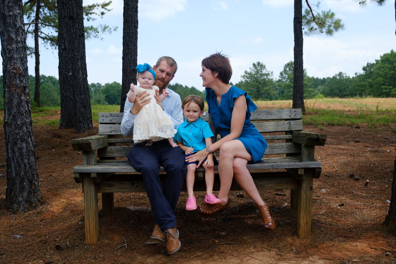 Nicole Ewens with her husband and children in Macon on Tuesday, June 14, 2022. (Arvin Temkar / arvin.temkar@ajc.com)