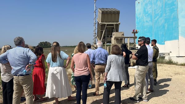 An Israeli soldier briefs Georgia Gov. Brian Kemp and members of the Georgia delegation on Israel's antimissile Iron Dome system. (Courtesy Gov. Brian Kemp's office/TNS)