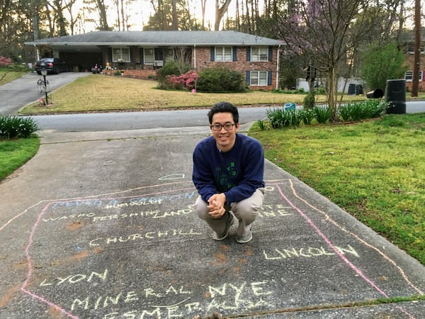 That's me with the map of Nevada drawn in our driveway March 17, 2020. I've since cut my hair. (Photo credit: Kai Sugiura)