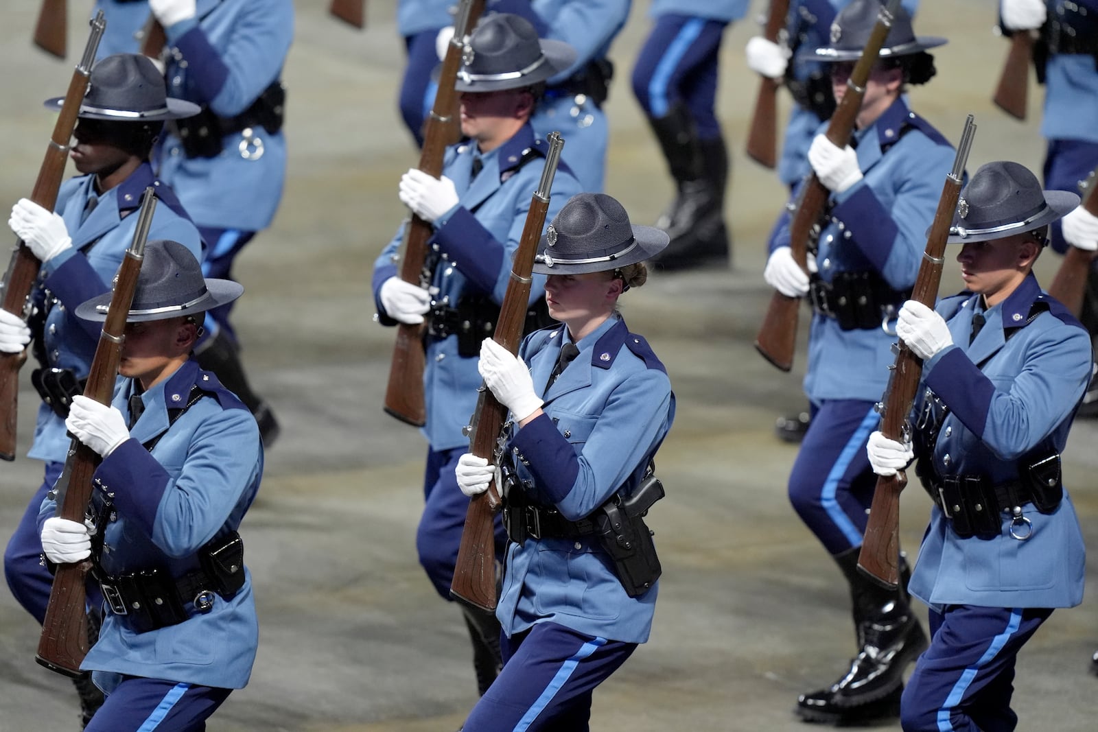 Members of the 90th Recruit Training Group of the Massachusetts State Police march, Wednesday, Oct. 9, 2024, during swearing in ceremonies at the DCU Center, in Worcester, Mass. (AP Photo/Steven Senne)