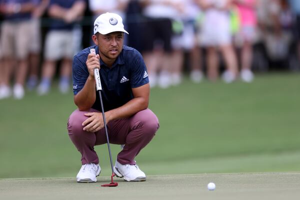 Xander Schauffele prepares to putt on the seventh green during the second round of the Tour Championship at East Lake Golf Club, Friday, August 26, 2022, in Atlanta. (Jason Getz / Jason.Getz@ajc.com)