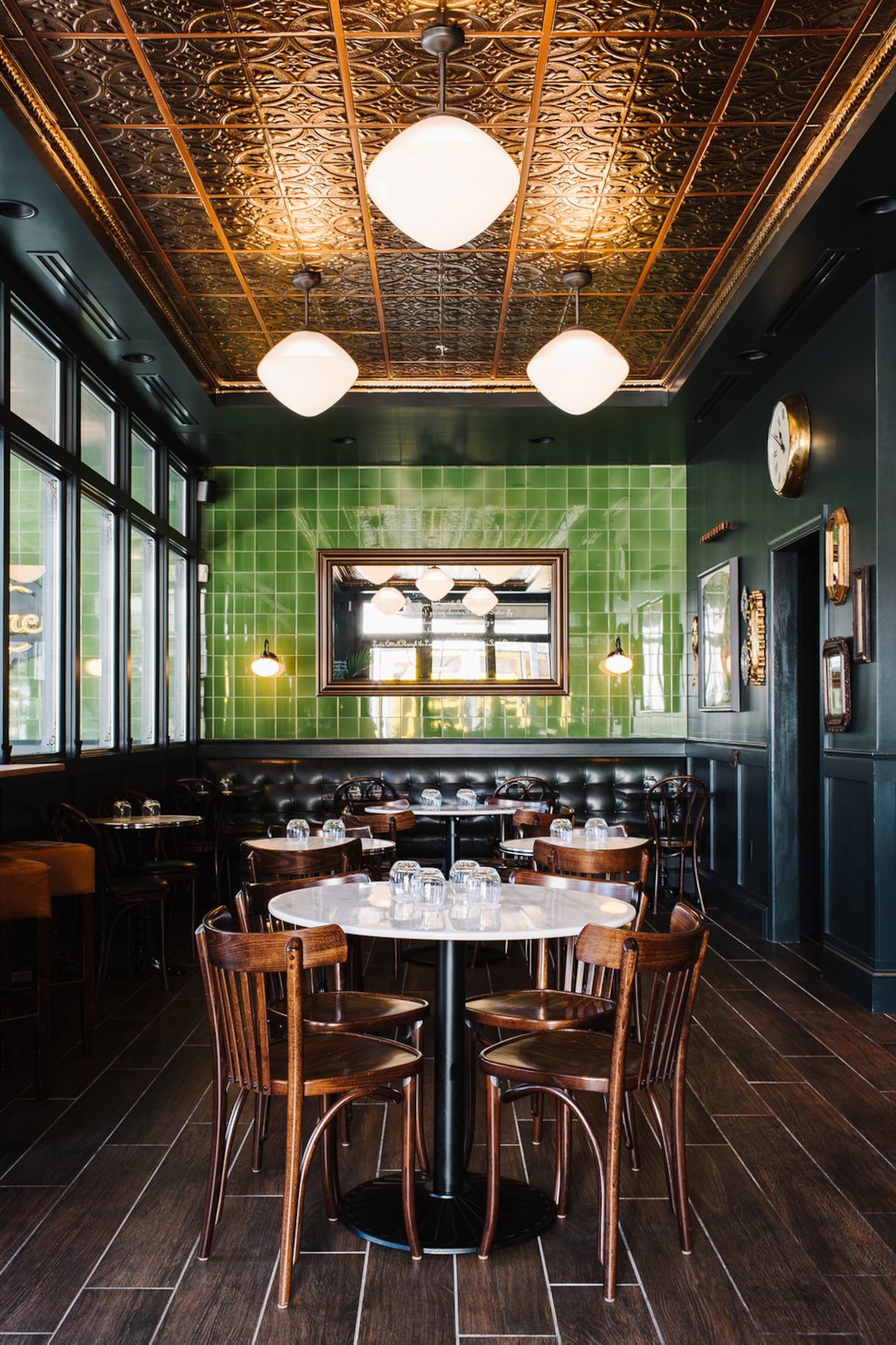 Inman Park’s Bread & Butterfly features whimsical decor, including green walls and a tin ceiling. CONTRIBUTED BY ANDREW THOMAS LEE