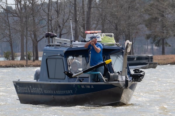 Keith Cormican, founder of Bruce’s Legacy, a volunteer organization that provides search and recovery operations for drowned victims, pulls a sonar unit aboard his boat while searching for the body of Gary Jones in Lake Oconee in Eatonton on Saturday, March 8, 2025.   Ben Gray for the Atlanta Journal-Constitution