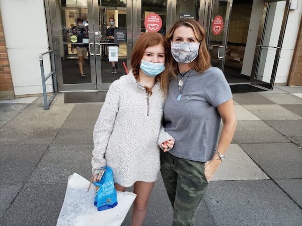 Shopping is more tense during the pandemic, said Trina Keuller and her daughter, who were recently shopping at Perimeter Mall in Dunwoody. Retailers and shopping center owners have prepped for an usual but crucial holiday shopping season. MATT KEMPNER / AJC