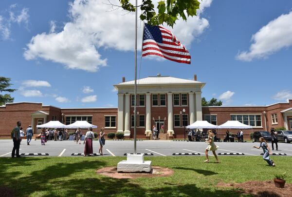 July 10, 2021 Plains - Guests arrive for 75th wedding anniversary celebration of Former U.S. President Jimmy Carter and his wife, Rosalynn, at Plains High School in Plains on Saturday, July 10, 2021. (Hyosub Shin / Hyosub.Shin@ajc.com)