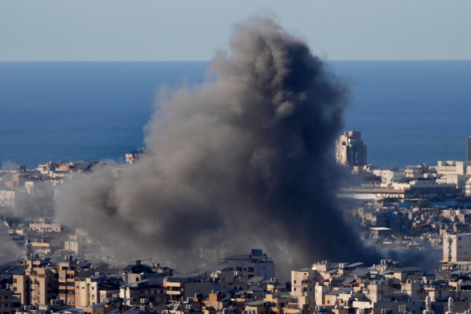 Smoke rises from Israeli airstrikes on Dahiyeh, in the southern suburb of Beirut, Lebanon, Saturday, Oct. 19, 2024. (AP Photo/Hussein Malla)