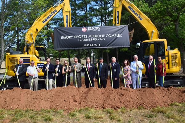 Brookhaven city officials including Mayor John Ernst, center, celebrate the June 24, 2016, groundbreaking of the Emory Sports Medicine Complex. (Photo Handout)