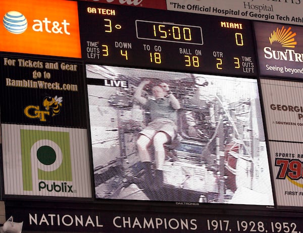 Georgia Tech graduate Eric Boe from the Space Shuttle is shown on the jumbotron during a 2008 Tech football game.