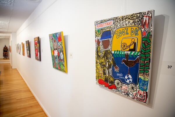 Sadio Diallo's artwork hangs on the wall of the Haugabrooks gallery on Auburn Ave Friday, September 03, 2021. STEVE SCHAEFER FOR THE ATLANTA JOURNAL-CONSTITUTION