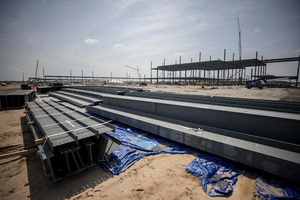 Large steel I-beams are staged near the paint building at the Hyundai Metaplant site, Monday, July 5, 2023, in Ellabell, Ga. (Stephen B. Morton for the AJC)