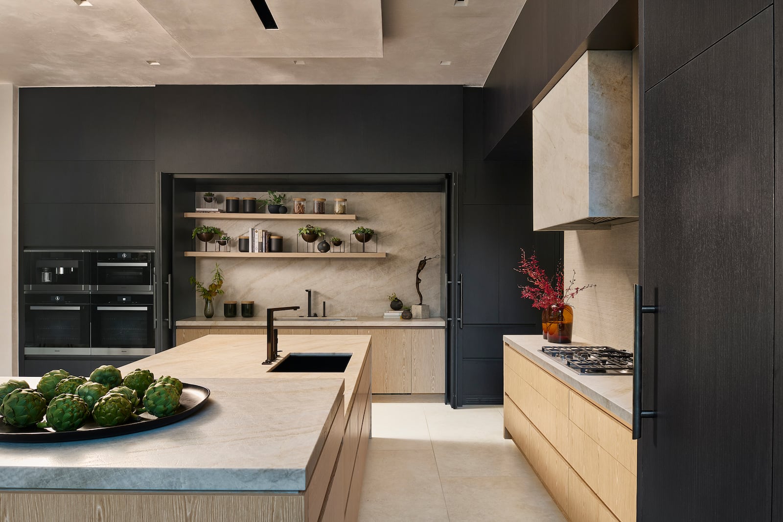 Natural stone countertops like the ones shown here are interior designer Michael Habachy's preference over tile countertops. Photo: Courtesy of Habachy Designs