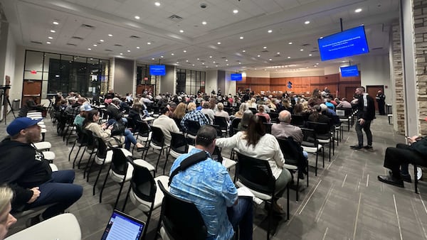 A large crowd gathered at the Cherokee County school board meeting on Feb. 15, 2024. The board voted 4-3 to hire Mary Elizabeth Davis as its next superintendent. Davis is currently the superintendent of Henry County's school district. (Atlanta Journal-Constitution/Jason Allen)