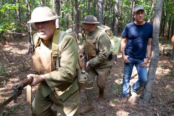 Mike Rowe and Chuck Klausmeyer shooting scene in "Six Degrees with Mike Rowe" in Macon. DISCOVERY+