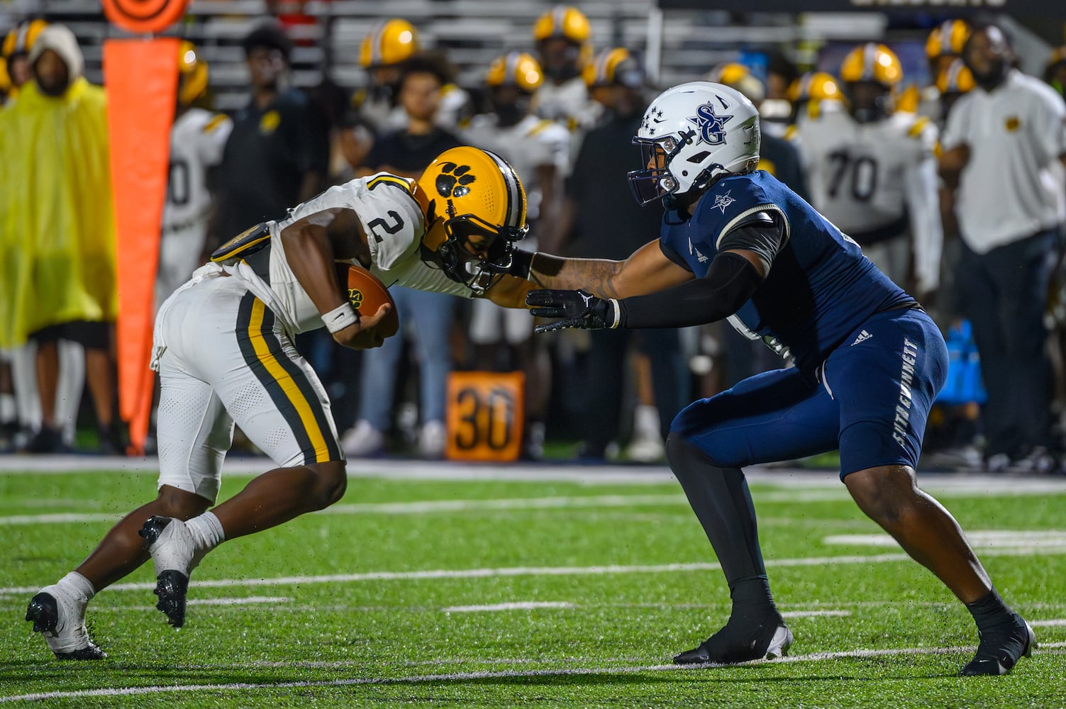 Valdosta’s Todd Robinson is taken down by his facemask during the game against South Gwinnett on September 13, 2024. Valdosta won 27-14. (Jamie Spaar for the Atlanta Journal Constitution)