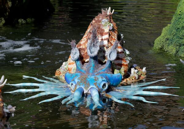 In this Saturday, April 29, 2017 photo, a water creature floats in a pond at Pandora-World of Avatar land attraction in Disney's Animal Kingdom theme park at Walt Disney World in Lake Buena Vista, Fla. The 12-acre land, inspired by the âAvatarâ movie, opens in Florida at the end of May at Walt Disney Worldâs Animal Kingdom. It cost a half-billion dollars. (AP Photo/John Raoux)