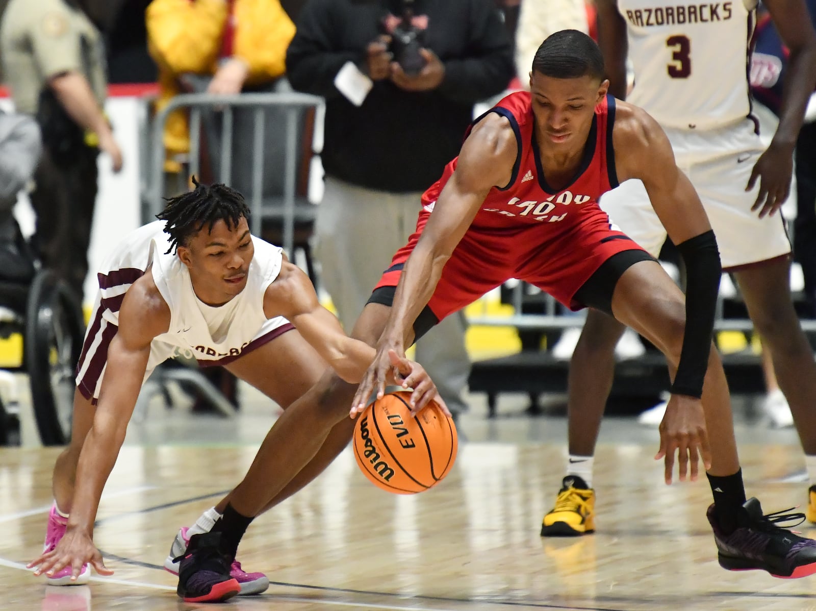 Cross Creek's Devin Pope (left) reaches in for a ball from Sandy Creek's Jabari Smith (10) during the Class 3A championship game Friday, March 12, 2021, in Macon. Cross Creek won 57-49. (Hyosub Shin / Hyosub.Shin@ajc.com)