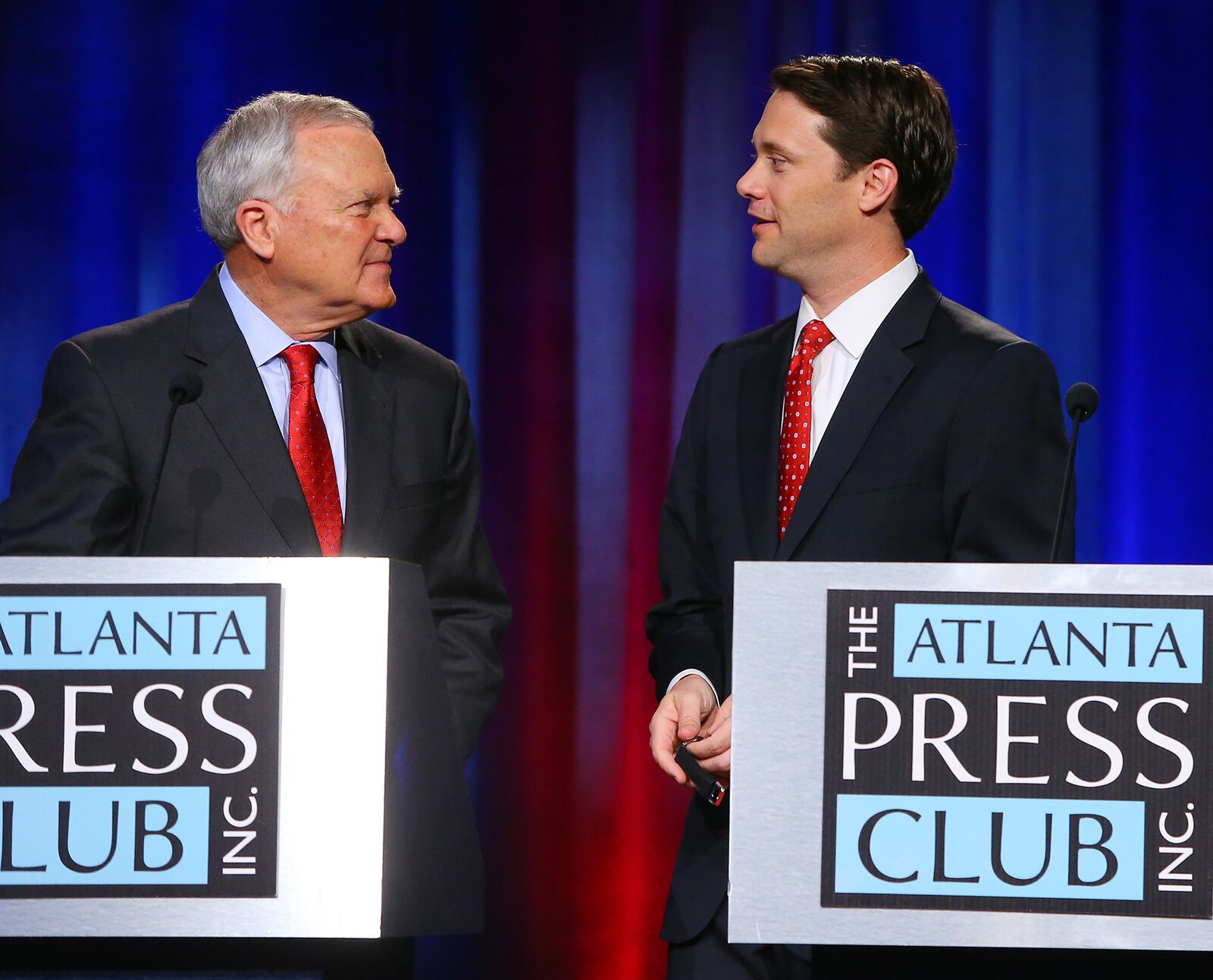 Republican Gov. Nathan Deal, left, and Jason Carter, then a Democratic state senator, ran against each other in the 2014 race for governor. It was a contest that turned on the state's byzantine formula for funding public schools. Carter is often mentioned as a potential candidate in 2026, when the state will see an open governor's race.