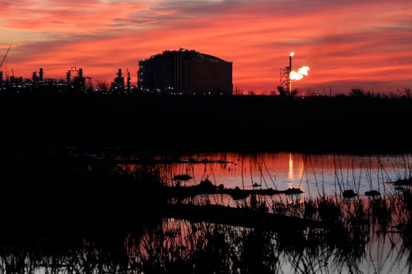 FILE - A flare burns at Venture Global LNG in Cameron, La., April 21, 2022. (AP Photo/Martha Irvine, File)