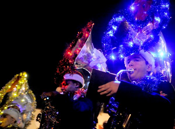 121011 (Meg Roussos/The Palm Beach Post) LAKE WORTH-Musicians of John I. Leonard High School marched in the annual Lake Worth Holiday parade on Saturday with their decorated and colorful instruments.