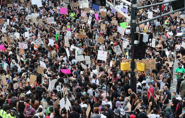 More than 1000 protesters fill Marietta Street at Centennial Olympic Park Drive outside the CNN Center at Olympic Park during a fifth day of protests over the death of George Floyd on Tuesday, June 2, 2020, in Atlanta. The state’s top public health official said she is concerned protest could be spreading the coronavirus and urged participants to be tested. CURTIS COMPTON / CCOMPTON@AJC.COM