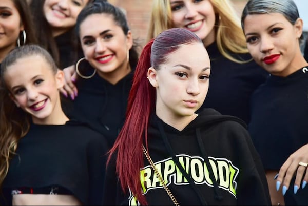 Bhad Bhabie (2nd R) poses with festivalgoers backstage during Day 2 of the Billboard Hot 100 Festival 2018 at Northwell Health at Jones Beach Theater on August 19, 2018 in Wantagh, New York.