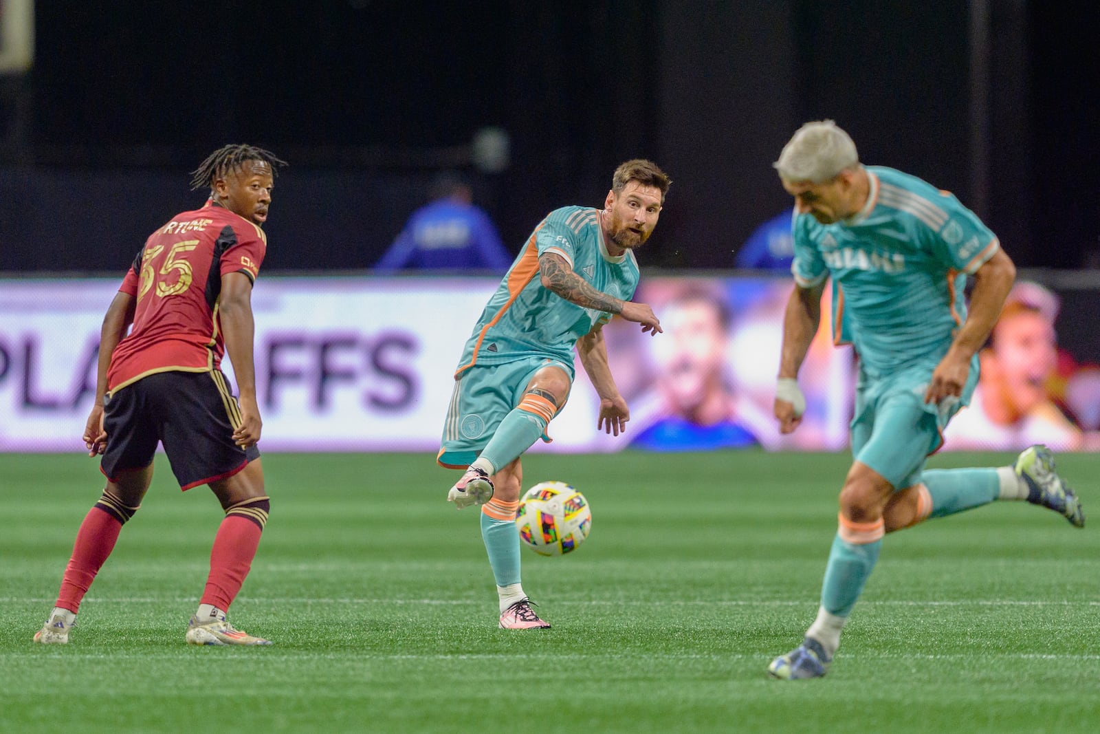 Inter Miami forward Lionel Messi (10) passes the ball during the first half of an MLS soccer match against Atlanta United, Saturday, Nov. 2, 2024, in Atlanta. (AP Photo/Jason Allen)