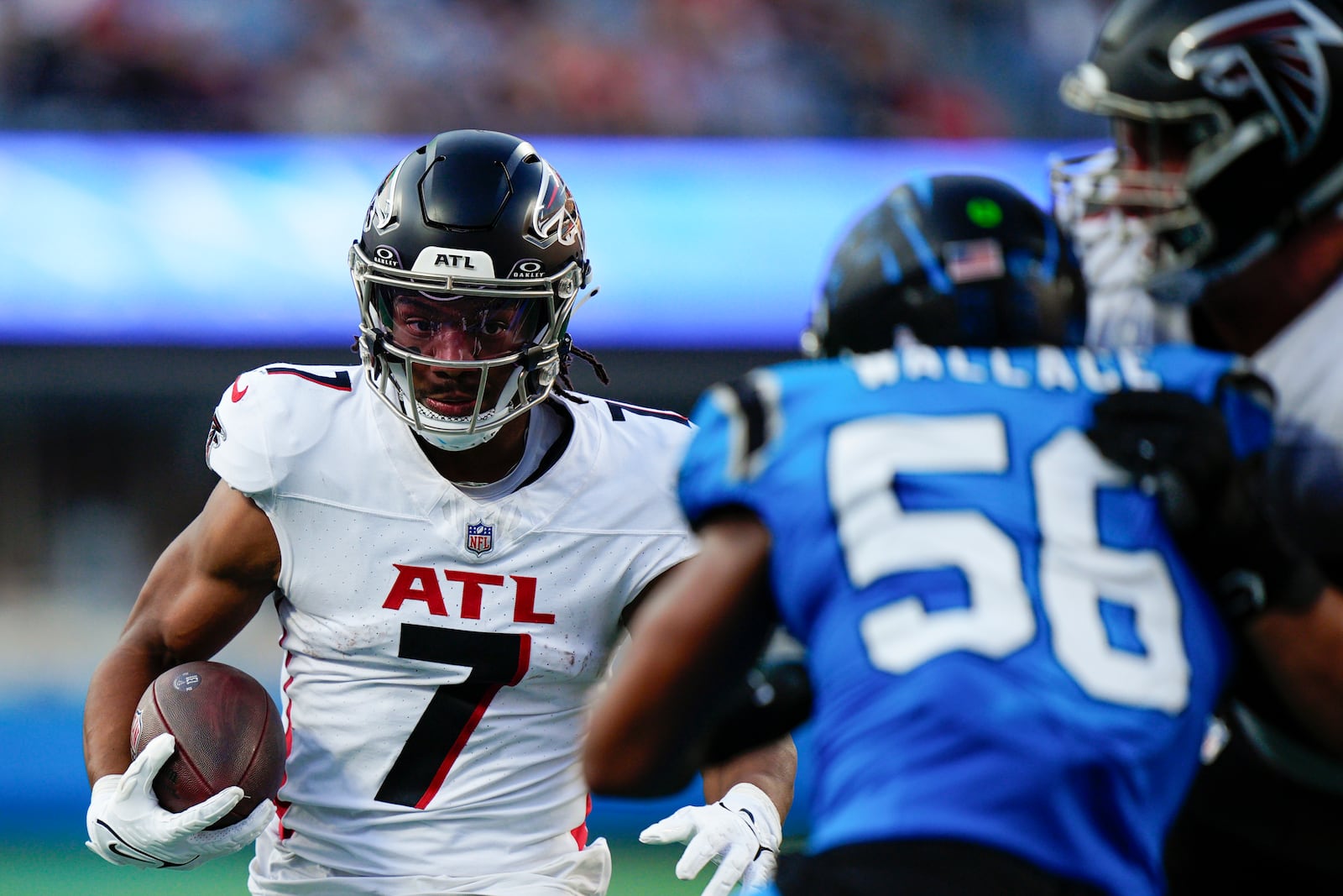 Atlanta Falcons running back Bijan Robinson (7) runs the ball in the first half of an NFL football game against the Carolina Panthers in Charlotte, N.C., Sunday, Oct. 13, 2024. (AP Photo/Jacob Kupferman)