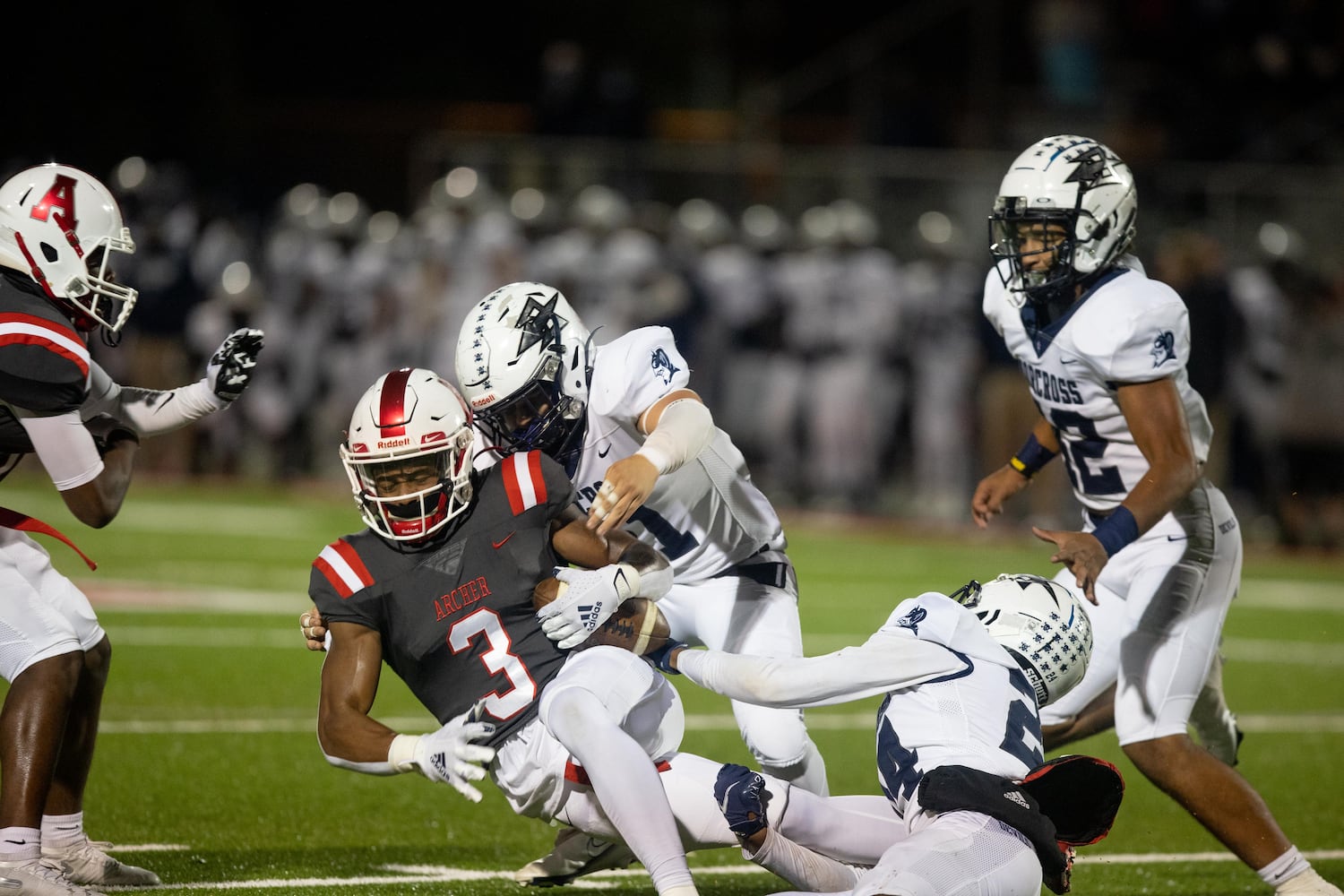 Archer's Derrick Moore II (3) is tackled at a GHSA high school football game between Archer High School and Norcross High School in Lawrenceville, GA., on Friday, November 5, 2021. (Photo/Jenn Finch)