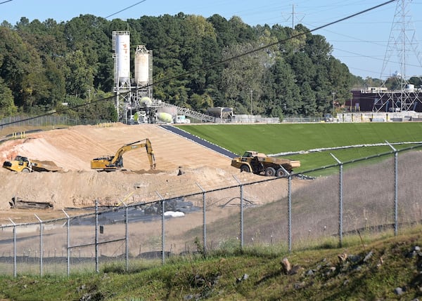 In the first three months of next year, Georgia's Environmental Protection Division could begin taking public comments for one of Georgia Power's cleanup plans, which would leave some coal ash in place at Plant McDonough.  (Daniel Varnado/ For The Atlanta Journal-Constitution)