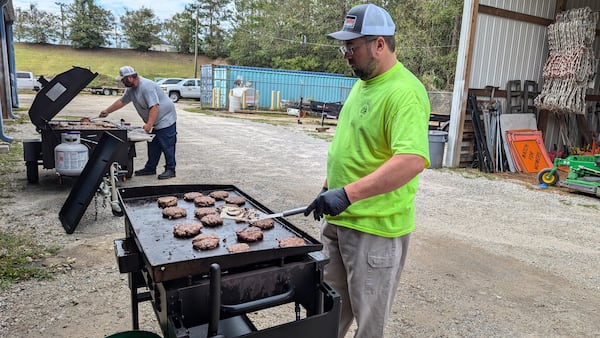 Grovetown employees man the grills at the town's community cookout on Sunday, September 29, 2024.