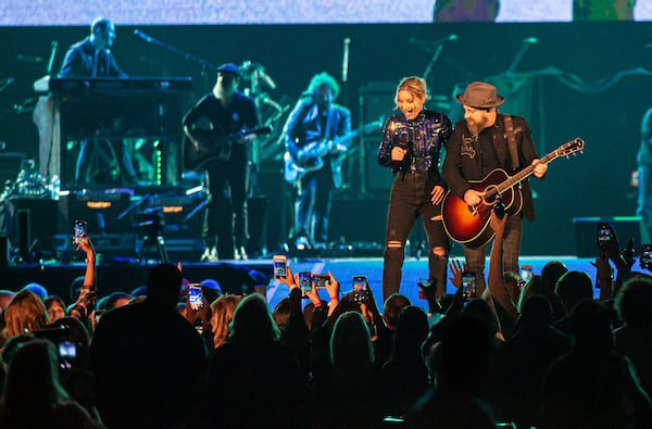 Sugarland's Jennifer Nettles and Kristian Bush play to the crowd at Mercedes-Benz Stadium fior ATLive on Nov. 15, 2019. Photo: Ryan Fleisher/Special to the AJC.