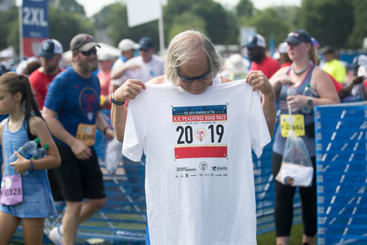 PHOTOS: Scenes at 2019 AJC Peachtree Road Race