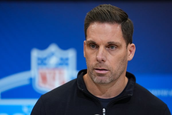 Carolina Panthers general manager Dan Morgan speaks during a press conference at the NFL football scouting combine in Indianapolis, Tuesday, Feb. 25, 2025. (AP Photo/Michael Conroy)