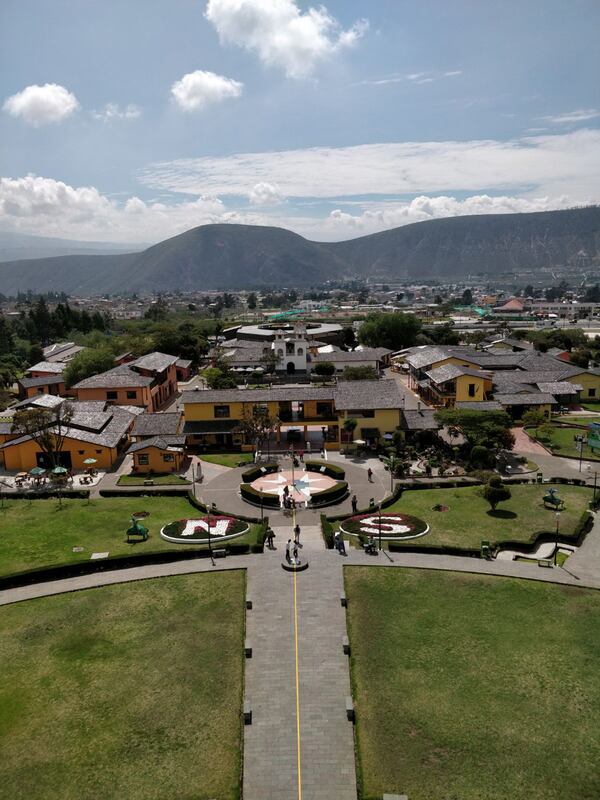 At Mitad del Mundo (literally the Middle of the World) in Quito, Ecuador, a yellow line marks the equator and an N and S represent northern and southern hemispheres, as seen from an observation tower. (Caitlin E. O'Conner/Tampa Bay Times/TNS)