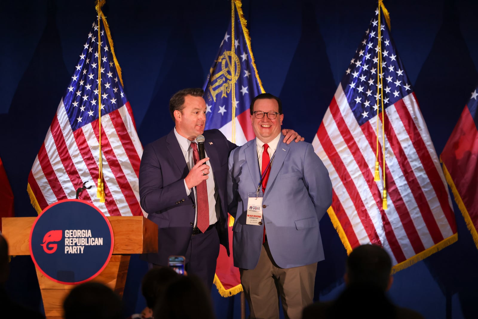 Georgia GOP Chair Josh McKoon (right), standing with Lt. Gov. Burt Jones, said Tuesday's election was "a clear mandate" for Donald Trump, “and a vindication of the strategy that we executed.” (Jason Getz/AJC)
