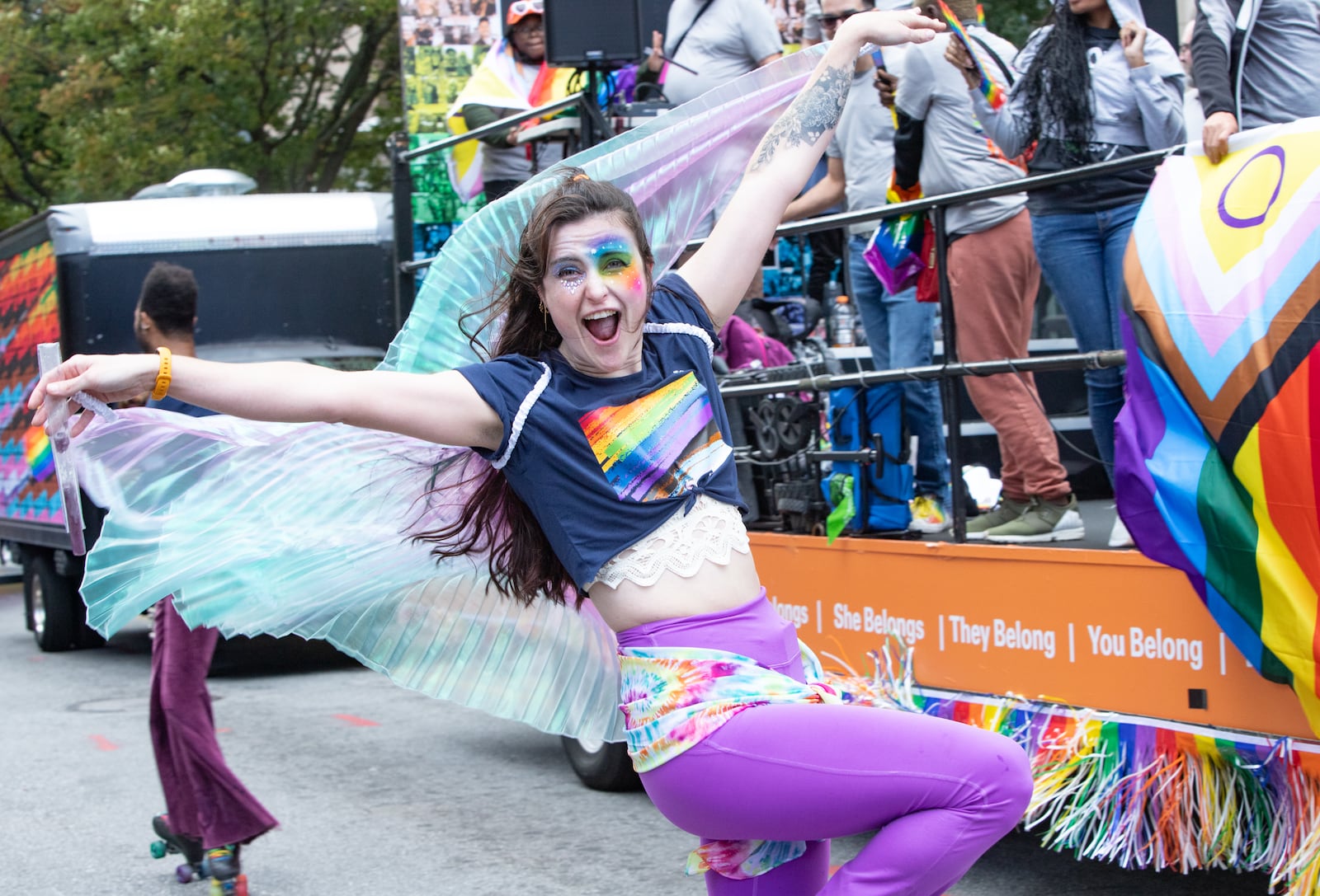 Amanda Rowe roller skates up Peachtree Street during the annual Pride Parade on Sunday, Oct 15, 2023. (Jenni Girtman for the AJC)