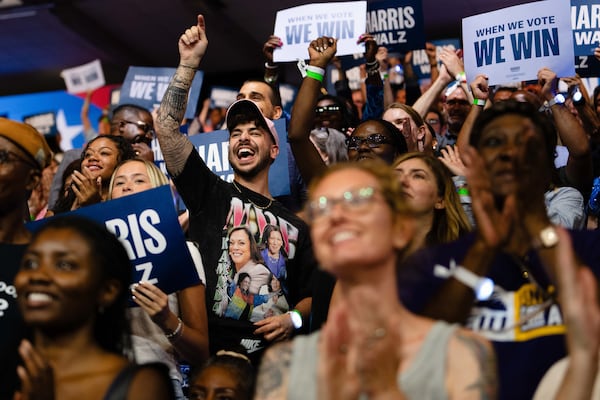 Supporters of Vice President Kamala Harris and her running mate, Minnesota Gov. Tim Walz, rally in Philadelphia.