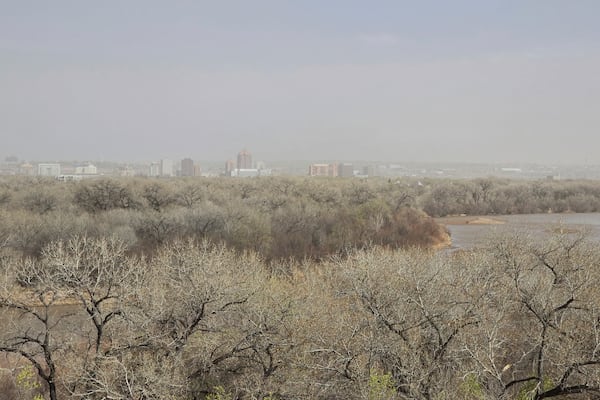 Dust fills the sky in Albuquerque, N.M., Tuesday, March 18, 2025. (AP Photo/Felicia Fonseca)